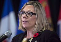 Manitoba Families Minister Rochelle Squires speaks at a news conference in Vancouver on Nov. 3, 2017. Squires has introduced a bill that would let people seek information about their partner's past if they believe there is a risk of violence to them or their children. THE CANADIAN PRESS/Darryl Dyck
