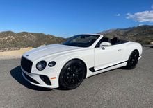 The 2023 Bentley Continental GTC on twisty mountain roads near Los Angeles.