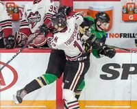 Guelph Storm's Alexey Toropchenko checks Prince Albert Raiders' Aliaksei Protas in second period 2019 Memorial Cup action in Halifax on Tuesday, May 21, 2019.