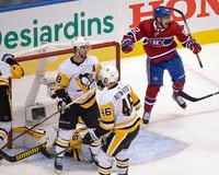 Montreal Canadiens left wing Artturi Lehkonen (62) celebrates his goal as Pittsburgh Penguins goaltender Tristan Jarry (35), Kris Letang (58) and Zach Aston-Reese (46) react during third period NHL Eastern Conference Stanley Cup playoff action in Toronto on Friday, August 7, 2020. T