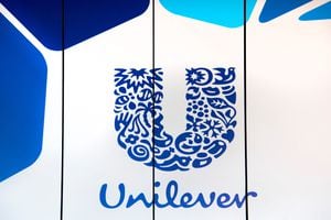 FILE PHOTO: The logo of Unilever is seen at the headquarters in Rotterdam, Netherlands August 21, 2018. REUTERS/Piroschka van de Wouw