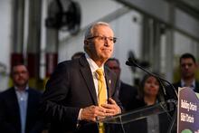 Ontario Minister of Economic Development Vic Fedeli gives remarks during a press conference at a Magna International production facility, in Brampton, Ont., on Wednesday, February 15, 2023. THE CANADIAN PRESS/Christopher Katsarov
