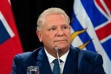 Ontario Premier Doug Ford listens to members of the media during a press conference in Ottawa, on Tuesday, Feb. 7, 2023. Ford believes the federal government will accept his recommendations on sustainability of a new health-care deal.THE CANADIAN PRESS/Spencer Colby