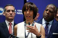 In this June 8, 2018, file photo, Baltimore Mayor Catherine Pugh addresses a gathering during the annual meeting of the U.S. Conference of Mayors, in Boston.