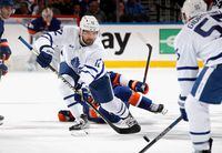 ELMONT, NEW YORK - MARCH 21: Zach Aston-Reese #12 of the Toronto Maple Leafs skates against the New York Islanders during the second period at the UBS Arena on March 21, 2023 in Elmont, New York. (Photo by Bruce Bennett/Getty Images)