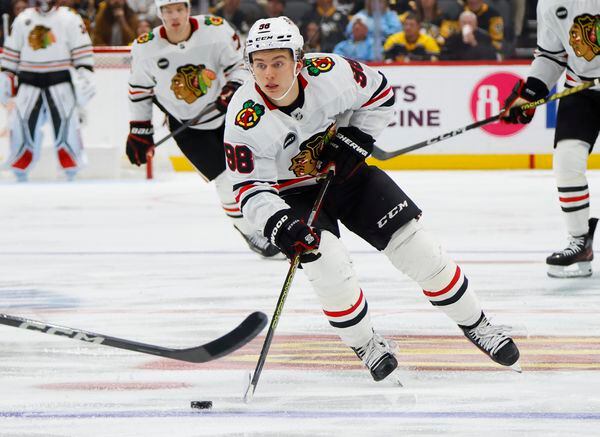 NHL: Bedard gets assist in NHL debut as Blackhawks rally past Penguins