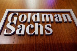 FILE PHOTO: FILE PHOTO: The Goldman Sachs company logo is seen on the floor of the New York Stock Exchange in New York City, U.S., July 13, 2021. REUTERS/Brendan McDermid/File Photo