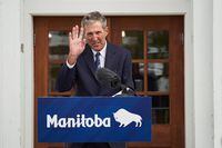 Manitoba Premier Brian Pallister announces that he will not be seeking re-election in front of the Dome Building in Brandon, Man., Tuesday, Aug. 10, 2021. THE CANADIAN PRESS/David Lipnowski