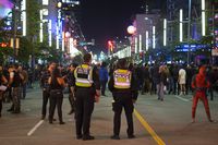 Police officers watch over the crowd on Granville Street in Vancouver, B.C., on Friday October 27, 2017. Darryl Dyck/The Globe and Mail