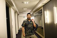 Usama Iqbal gets home to his studio apartment, in Toronto, on Thursday, June 9, 2022.  (Christopher Katsarov/The Globe and Mail)