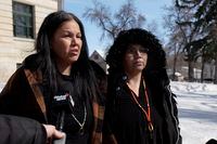 Odelia and Nerissa Quewezance, from left, speak to media outside Court of King's Bench in Yorkton, Sask., Monday, March 27, 2023. Odelia Quewezance, 50, and her sister, Nerissa Quewezance, 48, were convicted of the second-degree murder of Kamsack, Sask., farmer Anthony Dolff in 1993. Today, the sisters were granted conditional release from prison while their conviction undergoes a ministerial review to determine if there has been a miscarriage of justice. THE CANADIAN PRESS/Michael Bell