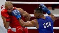 Arlen Lopez Cardona of Cuba in action against Benjamin Whittaker of Britain, Aug. 4, 2021. REUTERS/Carl Recine