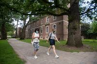People walking past Whitney Hall, a co-ed residence at the University of TorontoÕs St. George campus, are photographed on July 28 2020.