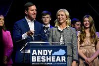 Kentucky Gov. Andy Beshear speaks during an election night rally after he was elected to a second term in Louisville, Ky., Tuesday, Nov. 7, 2023. At right is his wife Britiany Beshear. (AP Photo/Timothy D. Easley)