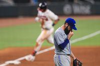 Matt Shoemaker of the Toronto Blue Jays reacts after giving up a three-run home run in the fifth inning to Atlanta's Austin Riley at Truist Park in Atlanta on Aug. 4, 2020.