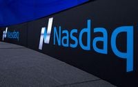 FILE PHOTO: The Nasdaq logo is displayed at the Nasdaq Market site in New York September 2, 2015. REUTERS/Brendan McDermid