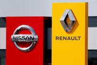 FILE PHOTO: The logos of car manufacturers Renault and Nissan are seen in front of dealerships of the companies in Reims, France, July 9, 2019. REUTERS/Christian Hartmann/File Photo