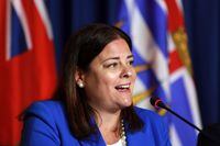 Manitoba Premier Heather Stefanson responds to a question from the media on the final day of the summer meeting of Canada's Premiers at the Fairmont Empress in Victoria, B.C., on Tuesday, July 12, 2022. THE CANADIAN PRESS/Chad Hipolito 