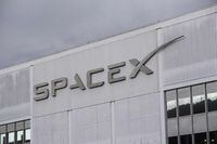 (FILES) In this file photo taken on January 28, 2021 the Space Exploration Technologies Corp. (SpaceX) headquarters in Hawthorne, California. - Elon Musk's SpaceX satellites will connect directly to T-Mobile cellphones to provide service access even in the most remote places beyond the reach of cell towers from next year, the two companies announced August 25, 2022. (Photo by Patrick T. FALLON / AFP) (Photo by PATRICK T. FALLON/AFP via Getty Images)