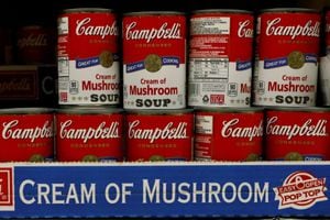 FILE PHOTO: Cans of Campbell's Soup are displayed in a supermarket in New York City, U.S. February 15, 2017. REUTERS/Brendan McDermid/File Photo