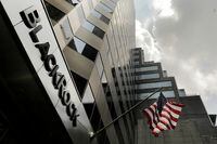 FILE PHOTO: A sign for BlackRock Inc hangs above the company's building in New York U.S., July 16, 2018. REUTERS/Lucas Jackson/File Photo