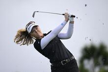 Brooke Henderson, of Canada, tees off on the ninth hole during the first round of the LPGA Pelican Women's Championship golf tournament at Pelican Golf Club, Friday, Nov. 11, 2022, in Belleair, Fla. (AP Photo/Phelan M. Ebenhack)