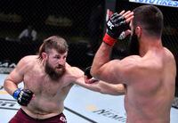 Tanner Boser punches Andrei Arlovski in a heavyweight fight during the UFC Fight Night event at UFC APEX on Nov. 7, 2020 in Las Vegas.