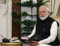 FILE PHOTO: India's Prime Minister Narendra Modi attends a meeting with Russia's President Vladimir Putin in New Delhi, India, December 6, 2021. Sputnik/Mikhail Klimentyev/Kremlin via REUTERS