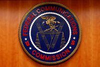 FILE PHOTO: The Federal Communications Commission (FCC) logo is seen before the FCC Net Neutrality hearing in Washington February 26, 2015. REUTERS/Yuri Gripas/File Photo