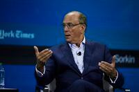 FILE — Larry Fink, CEO of BlackRock, delivers remarks at the 2022 NYT DealBook Summit in New York, on Nov. 30, 2022. Fink drew criticism from investors and politicians when the asset manager recently appointed a former oil company head Blackrock’s board. (Winnie Au/The New York Times)