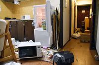 Furniture and electrical appliance are scattered at an apartment in Fukushima, northern Japan Wednesday, March 16, 2022, following an earthquake. A powerful earthquake shook off the coast of Fukushima in northern Japan on Wednesday, triggering a tsunami advisory.(Kyodo News via AP)
