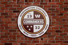LANDOVER, MARYLAND - FEBRUARY 02: A detailed view of a Washington Commanders logo during the announcement of the Washington Football Team's name change to the Washington Commanders at FedExField on February 02, 2022 in Landover, Maryland. (Photo by Rob Carr/Getty Images)