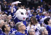Apr 21, 2019; Toronto, Ontario, CAN; A Toronto Maple Leafs fan waves a towel while dressed as the Easter bunny during game six of the first round of the 2019 Stanley Cup Playoffs against the Boston Bruins at Scotiabank Arena. The Bruins beat the Maple Leafs 4-2. Mandatory Credit: Tom Szczerbowski-USA TODAY Sports