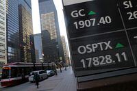 FILE PHOTO: A screen shows a price of Canada's main stock index, the Toronto Stock Exchange's S&P/TSX composite index, as it rose to a record high in Toronto, Ontario, Canada January 7, 2021.  REUTERS/Chris Helgren/File Photo