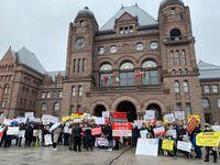 Traditional Chinese medicine practitioners and students protest at Ontario’s legislature in Toronto on Monday, March 7, 2022 over a provincial government plan to deregulate their profession. The government later announced it would scrap the plan. THE CANADIAN PRESS/Holly McKenzie-Sutter