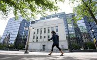 This week, the Bank of Canada hiked interest rates yet again, raising its key interest rate by a quarter of a percentage point to 5 per cent, and the prime rate to 7.2 per cent. A woman walks past the Bank of Canada headquarters in Ottawa, Wednesday, June 1, 2022. THE CANADIAN PRESS/Adrian Wyld