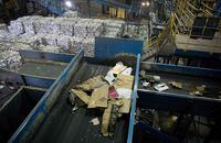 Recycling material moves along a conveyor belt to be sorted at the Waste Management Material Recovery Facility in Elkridge, Maryland, June 28, 2018.

For months, this major recycling facility for the greater Baltimore-Washington area has been facing a big problem: it has to pay to get rid of huge amounts of paper and plastic it would normally sell to China.  Beijing is no longer buying, claiming the recycled materials are "contaminated."
 / AFP PHOTO / SAUL LOEBSAUL LOEB/AFP/Getty Images