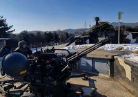 YANGJU, SOUTH KOREA - DECEMBER 29: In this handout image released by the South Korean Defense Ministry, South Korean soldiers operating a 20mm Vulcan rotary cannon during an anti-drone drill on December 29, 2022 in Yangju,South Korea. South Korean military conducted drills to strengthen its defense against potential drone-based provocations by North Korea, Seoul officials said, as it has vowed to adopt an "aggressive" approach to counter the renewed security challenge. The drills were arranged after the military failed to shoot down five North Korean drones that violated the South's air space on Monday, in an infiltration that raised questions over its readiness posture. (Photo by South Korean Defense Ministry via Getty Images)