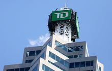 FILE PHOTO: The TD bank logo is seen on top of the Toronto Dominion Canada Trust Tower in Toronto, Ontario, Canada March 16, 2017. Picture taken March 16, 2017.   REUTERS/Chris Helgren/File Photo