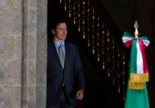 Canadian Primer Minister Justin Trudeau smiles upon his arrival for an agreement signing ceremony with Mexico's President Andrés Manuel López Obrador at the National Palace in Mexico City, Wednesday, Jan. 11, 2023. (AP Photo/Fernando Llano)