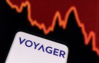 Voyager Digital logo and decreasing stock graph are seen in this illustration taken, July 7, 2022. REUTERS/Dado Ruvic/Illustrations