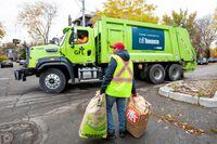 FILE PHOTO: A truck from Canadian waste management company GFL Environmental Inc, which is planning an IPO, makes its rounds through a neighbourhood in Toronto, Ontario, Canada November 5, 2019.   REUTERS/Carlos Osorio/File Photo