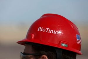 FILE PHOTO: The Rio Tinto logo is displayed on a visitor's helmet at a borates mine in Boron, California, U.S., November 15, 2019. REUTERS/Patrick T. Fallon/File Photo