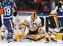 TORONTO, CANADA - NOVEMBER 11: Casey DeSmith #1 of the Pittsburgh Penguins makes the second period save on the Toronto Maple Leafs at the Scotiabank Arena on November 11, 2022 in Toronto, Ontario, Canada. (Photo by Bruce Bennett/Getty Images)