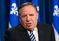 Quebec Premier François Legault responds to reporters' questions at a news conference, Tuesday, May 23, 2023, at the legislature in Quebec City. THE CANADIAN PRESS/Jacques Boissinot