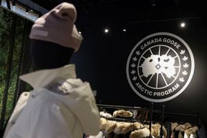 FILE PHOTO: The logo of Canada Goose is seen in a store in Manhattan, New York City, U.S., February 7, 2022. REUTERS/Andrew Kelly/File Photo