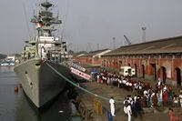 File - In this Dec. 5, 2019, file photo, Indian school children walk past the visiting Indian Navy warship INS Kirch for a guided tour in Kolkata, India. India is sending four navy ships for exercises and port visits with the Philippines, Vietnam, Singapore, Indonesia and Australia to strengthen cooperation in the Indo-Pacific region, its navy said Wednesday, as China's maritime power grows in the area. (AP Photo/Bikas Das, File)
