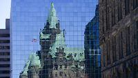 The Confederation Building reflects off the windows of a building in downtown Ottawa on Wednesday, April 7, 2020. The use of facial recognition technology as a security tool on Parliament Hill would pose substantial legal, privacy and human rights risks — and might even be unlawful, says a study prepared for the parliamentary security unit. THE CANADIAN PRESS/Sean Kilpatrick