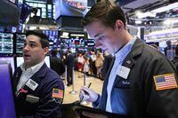 Traders work on the floor of the New York Stock Exchange (NYSE) in New York City, U.S., May 22, 2023.  REUTERS/Brendan McDermid