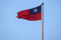 FILE PHOTO: A Taiwan flag can be seen at Liberty Square in Taipei, Taiwan, July 28, 2022. REUTERS/Ann Wang